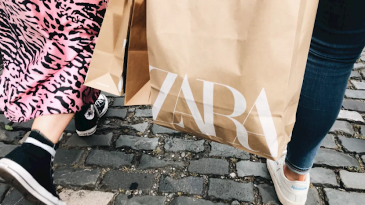 The most gorgeous Zara snake print knee-high boots are on sale right now