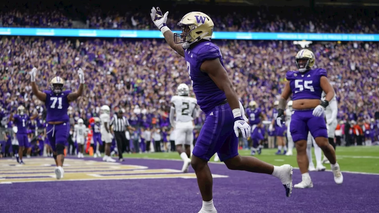 Late TD pass by Michael Penix Jr. lifts No. 8 Washington to wild 36-33 win over No. 7 Oregon