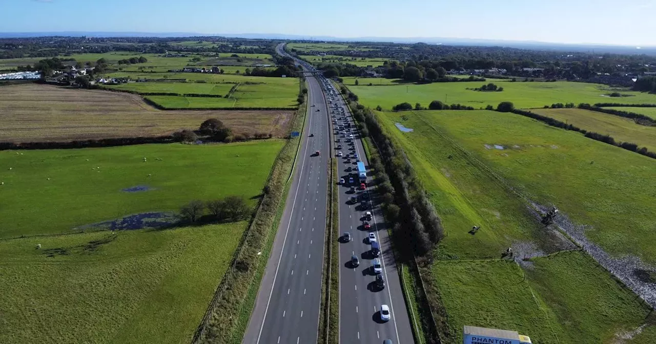 Motorway shut in both directions after body found on bridge