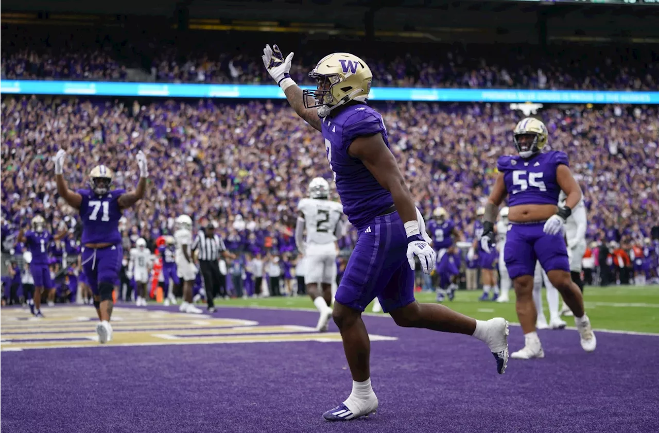 Late TD pass by Michael Penix Jr. lifts No. 8 Washington to wild 36-33 win over No. 7 Oregon