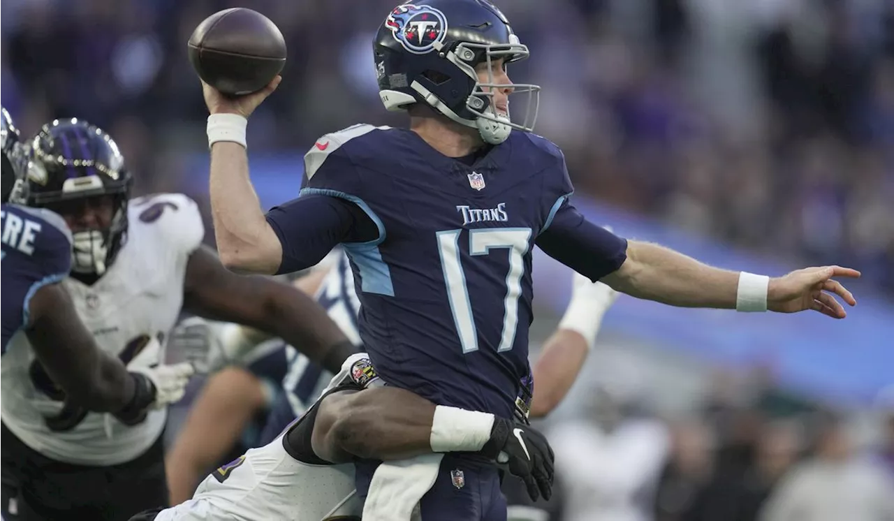 Ryan Tannehill injured and Tennessee Titans offense shut down by Baltimore Ravens in loss in London