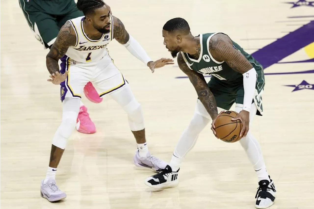 Lillard makes triumphant NBA pre-season debut with Bucks