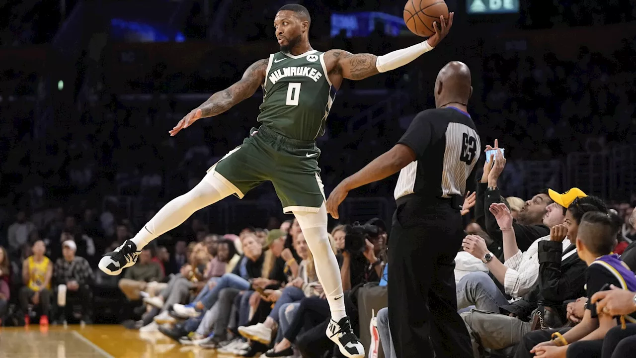 Lillard scores 14 points in Milwaukee debut as Bucks beat Lakers