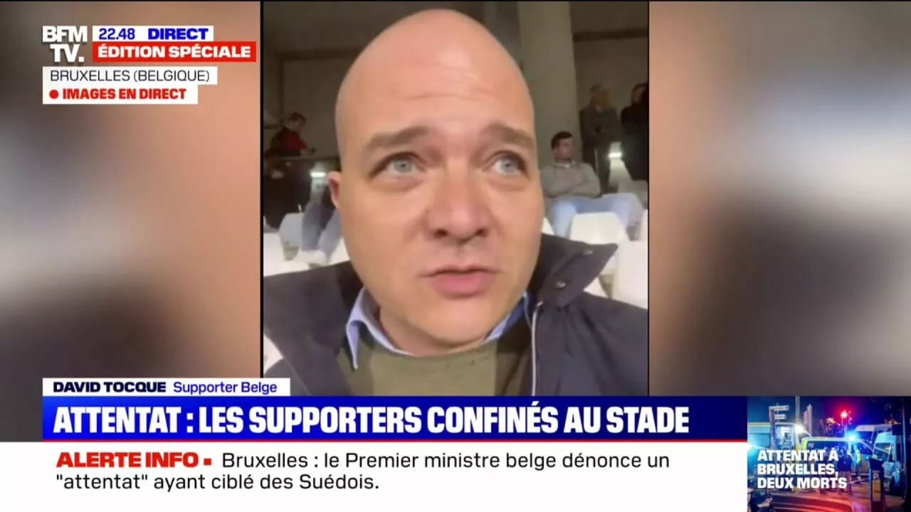 'Plus personne ne peut quitter l'enceinte du stade pour l'instant': les supporters confinés au stade Roi Baudouin, après l'interruption du match Belgique-Suède, décidée à la suite de l'attentat dans la capitale belge