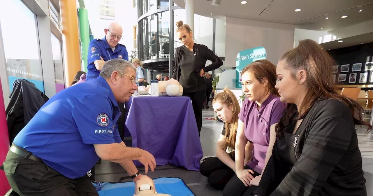 Wishaw members of St Andrew's First Aid offering CPR sessions