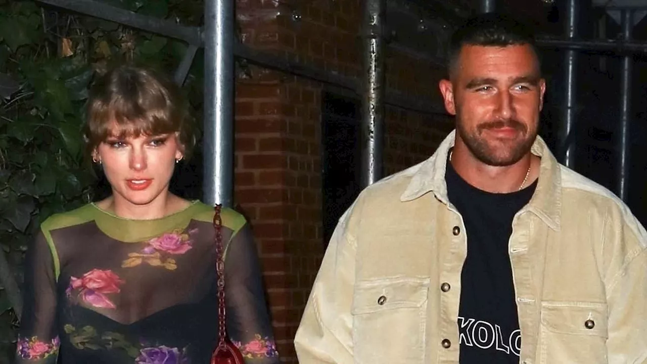 Taylor Swift's new lover Travis Kelce makes a touchdown! NFL star can't keep his hands off singer as...