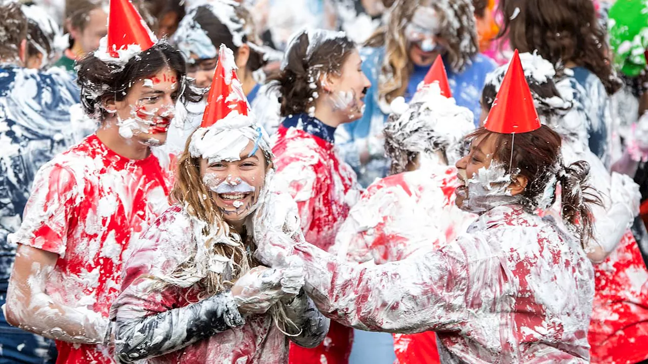 Frolicking freshers at St Andrews University work themselves up into a lather to celebrate...