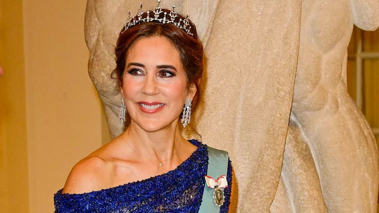 Princess Mary of Denmark and Sweden's Princess Victoria dazzle in diamond tiaras and stunning gowns...