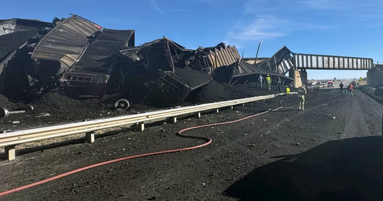 Semitruck driver killed when Colorado train derails, spilling train cars and coal onto a highway