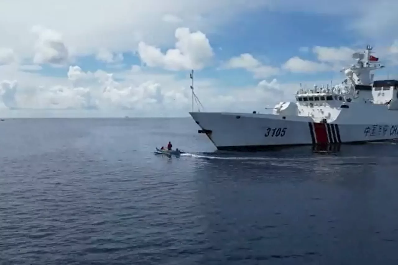 Chased-away Filipino fisherman goes around China Coast Guard ship