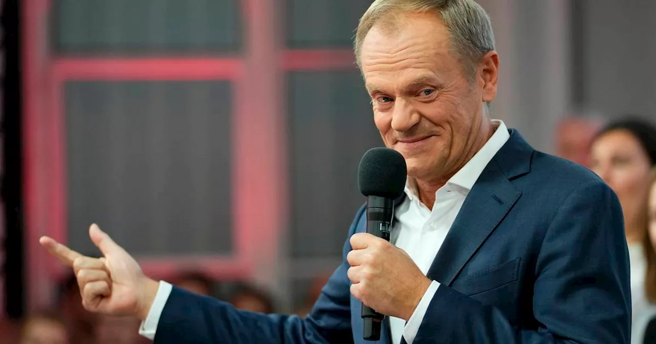 Poland election: Opposition leader Donald Tusk declares victory after ruling party appears to have fallen short