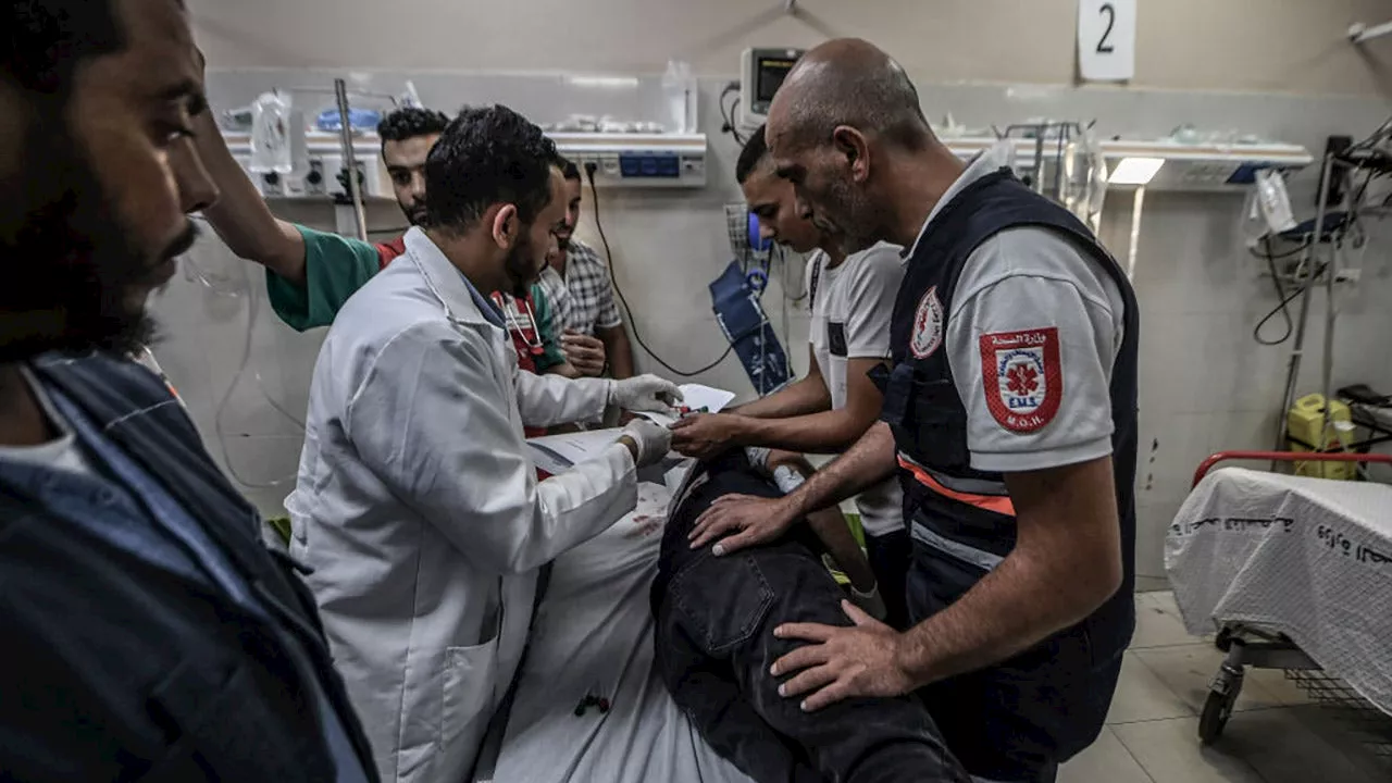 Humanitarian aid stuck at Gaza-Egypt border as Israeli siege strains hospitals