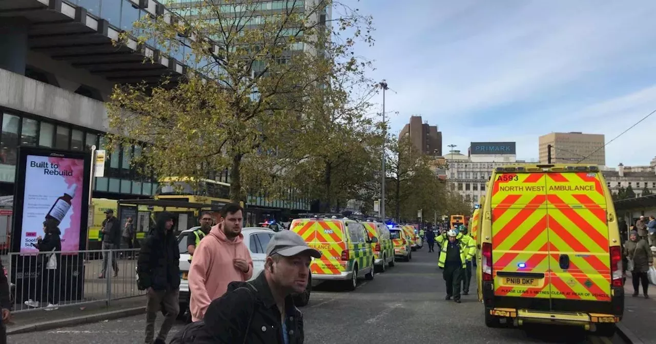 Huge police presence after bus crashes into Manchester building