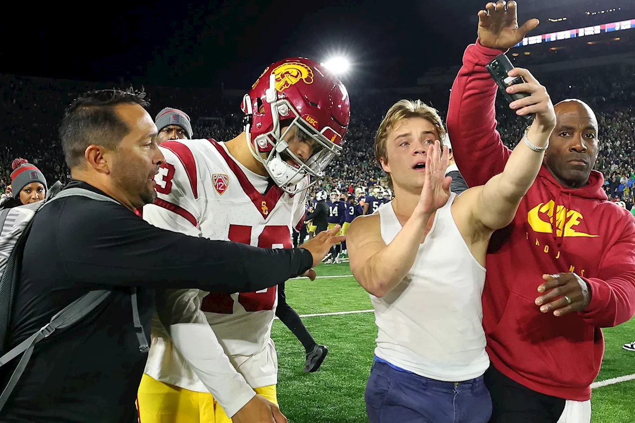 Notre Dame fan boldly trolls Caleb Williams over fingernails after storming the field