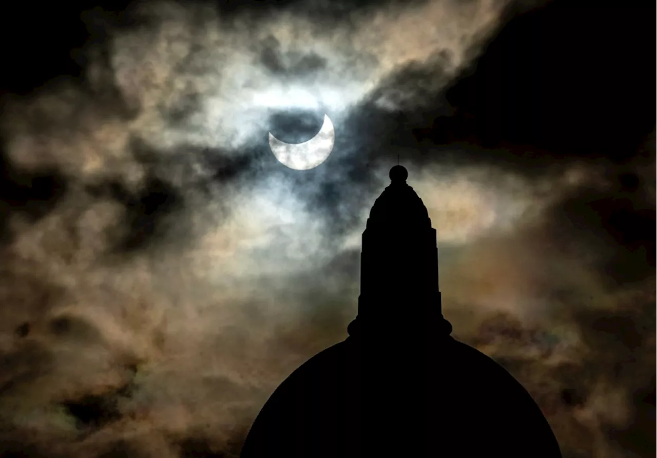 Photos: Annular eclipse peeks through clouds in parts of the Bay Area