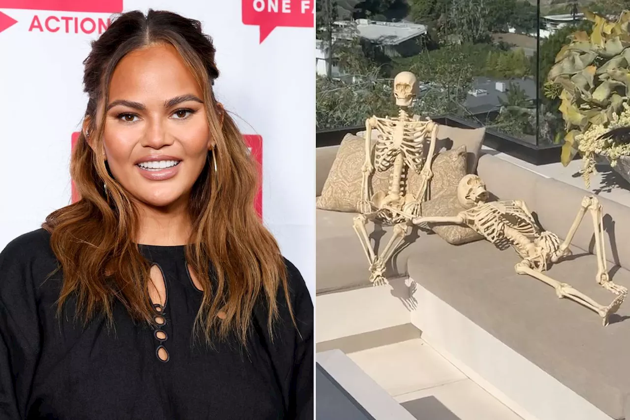 Chrissy Teigen Pokes Fun at Her Own Poolside Skeleton Display: ‘It’s Like Love Island in 100 Years’