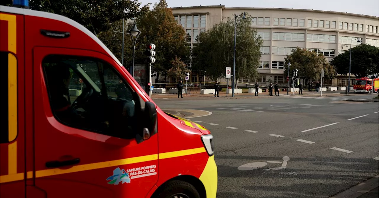 French high school where teacher was killed Friday evacuated over bomb alert