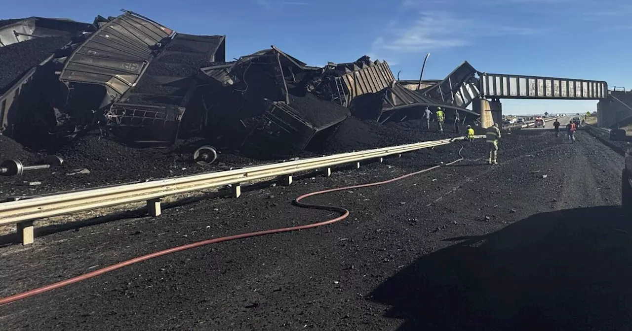 Semi-truck driver killed when Colorado train derails, spilling train cars and coal onto a highway