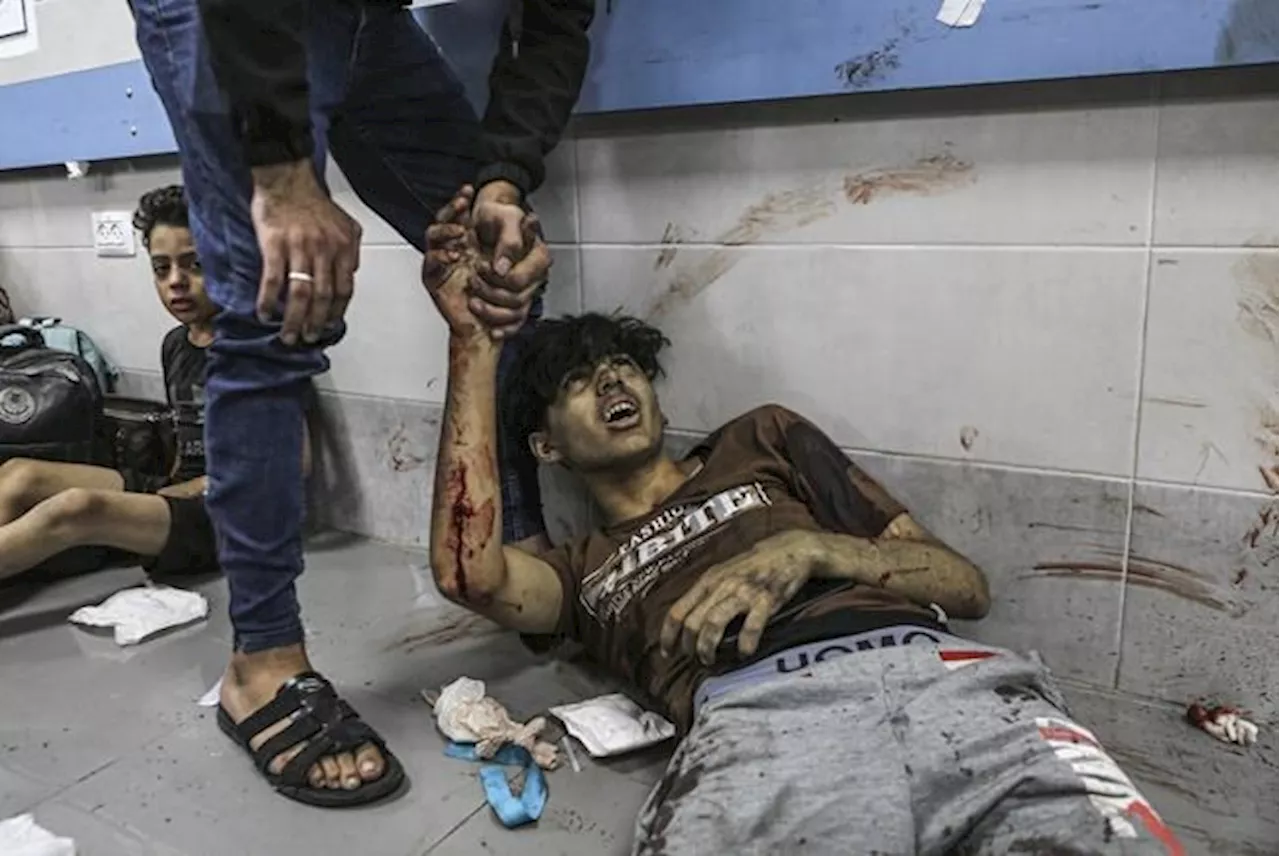 Blast kills hundreds at Gaza hospital; Hamas and Israel trade blame, as Biden heads to Mideast