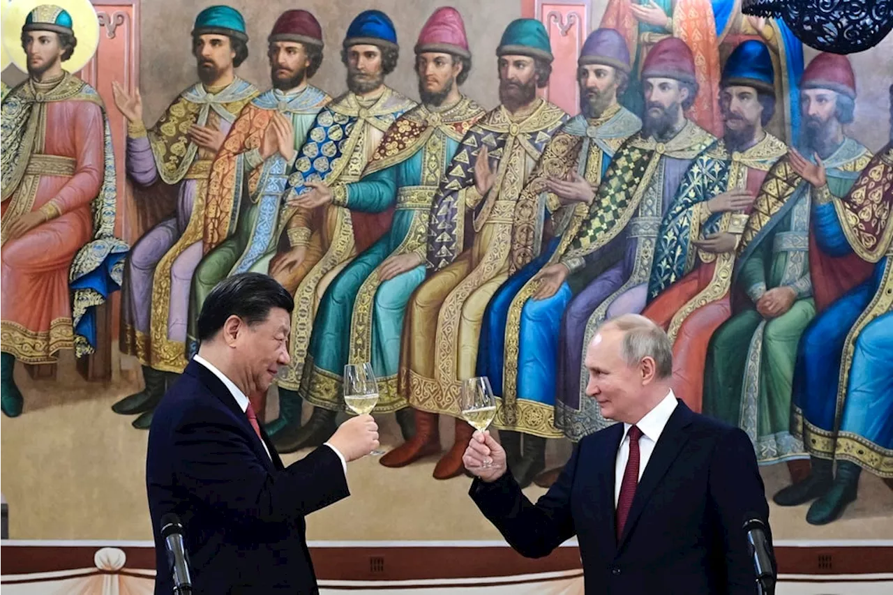 Putin visits ‘dear friend’ Xi in show of no-limits partnership