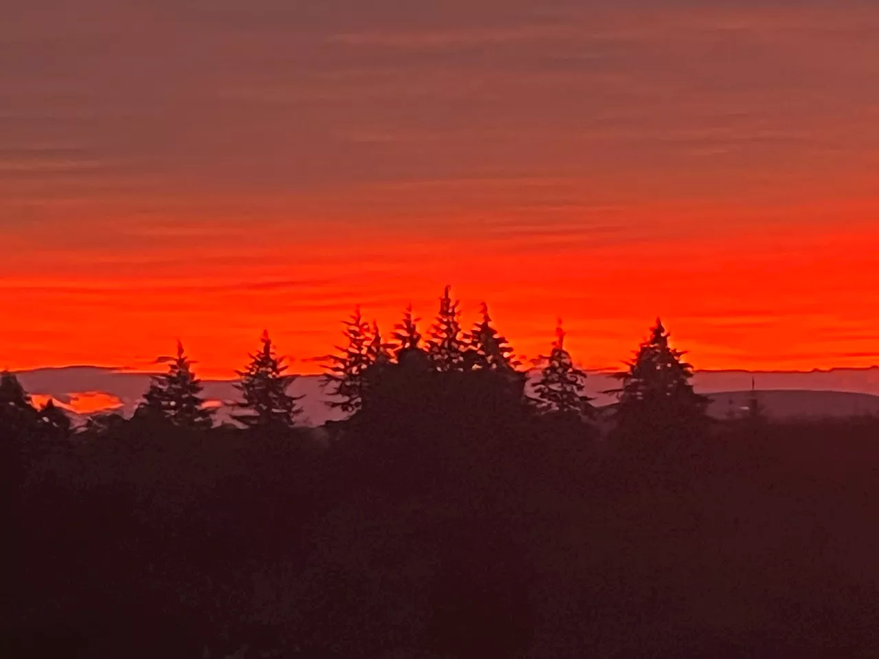 Northern Ireland wakes to red sunrise ahead of Storm Babet