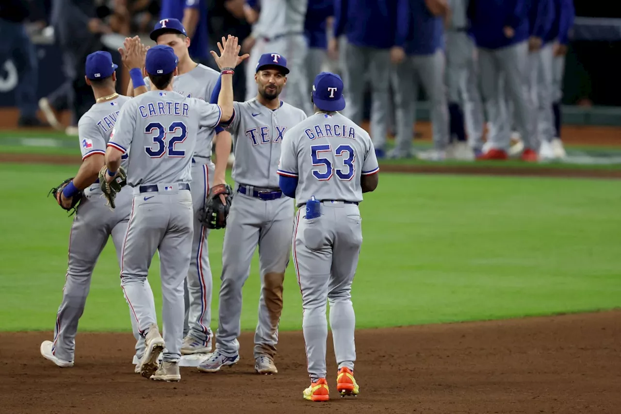 Rangers take 2-0 lead over champion Astros in MLB playoffs