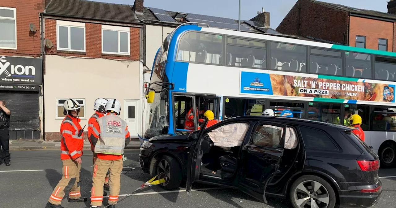 Injured woman rescued with six in hospital after double decker bus crash