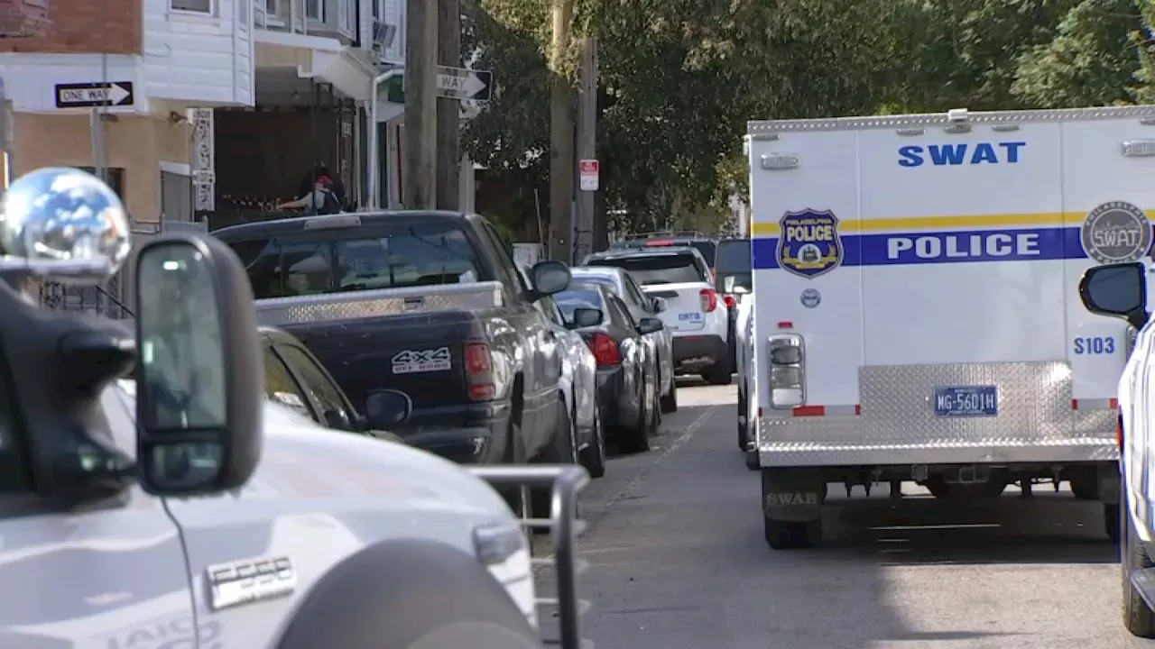 Suspected gunman barricades in property after shooting man to death in West Philly