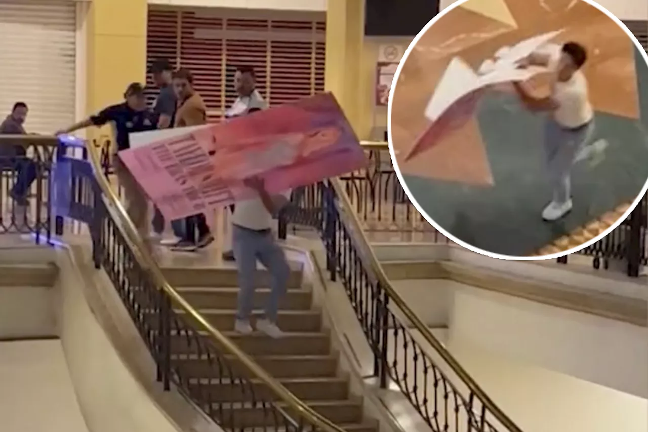 Taylor Swift superfan escapes mall security after stealing 'Eras' cardboard movie poster