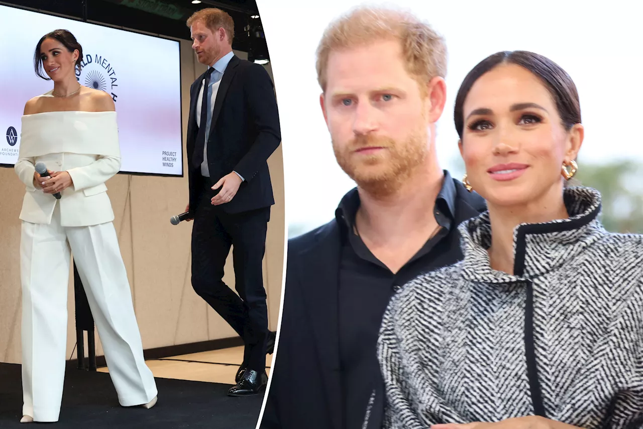 Meghan Markle and Prince Harry hold hands on romantic island getaway