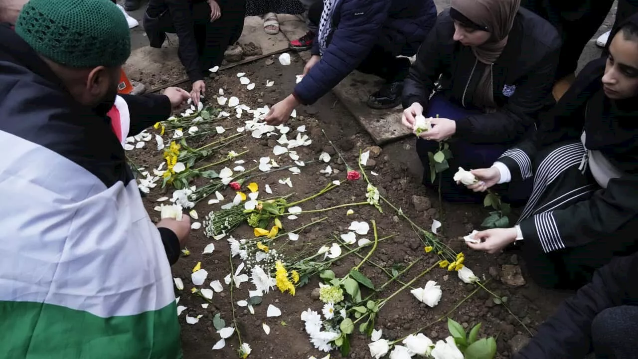 Slain Palestinian-American boy mourned as stabbing suspect appears in court