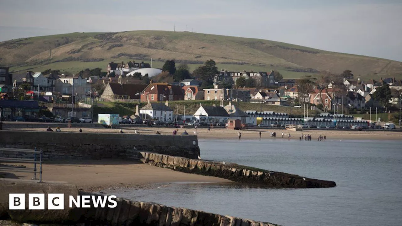 Swanage Bay flood warnings issued