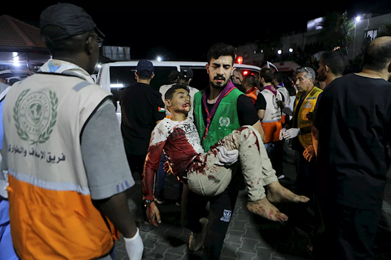 Gaza’s doctors struggle to save hospital blast survivors as Middle East rage grows