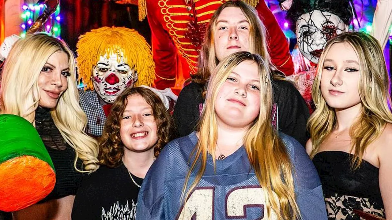 Tori Spelling takes her five children to Halloween Horror Nights in LA - amid estranged husband Dean...