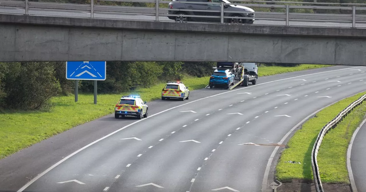 Air ambulance lands after woman falls from bridge on M62