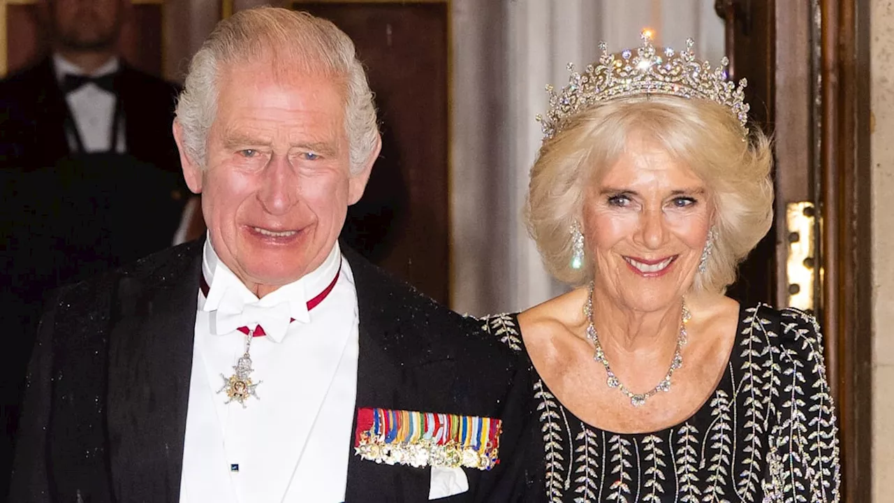 Queen Camilla shines in late Queen's tiara and diamonds for glittering reception with King Charles