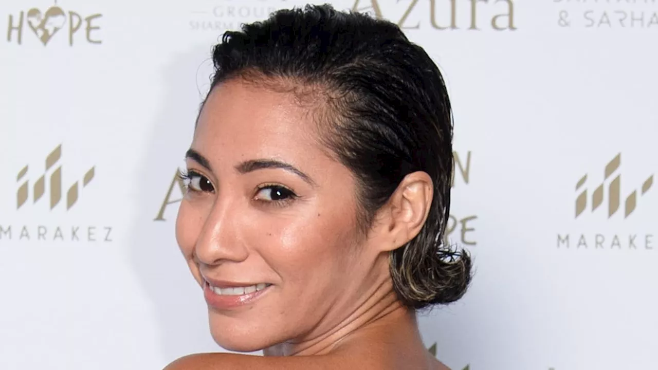 Strictly's Karen Hauer smoulders in slinky dress as she ditches wedding ring amid split reports