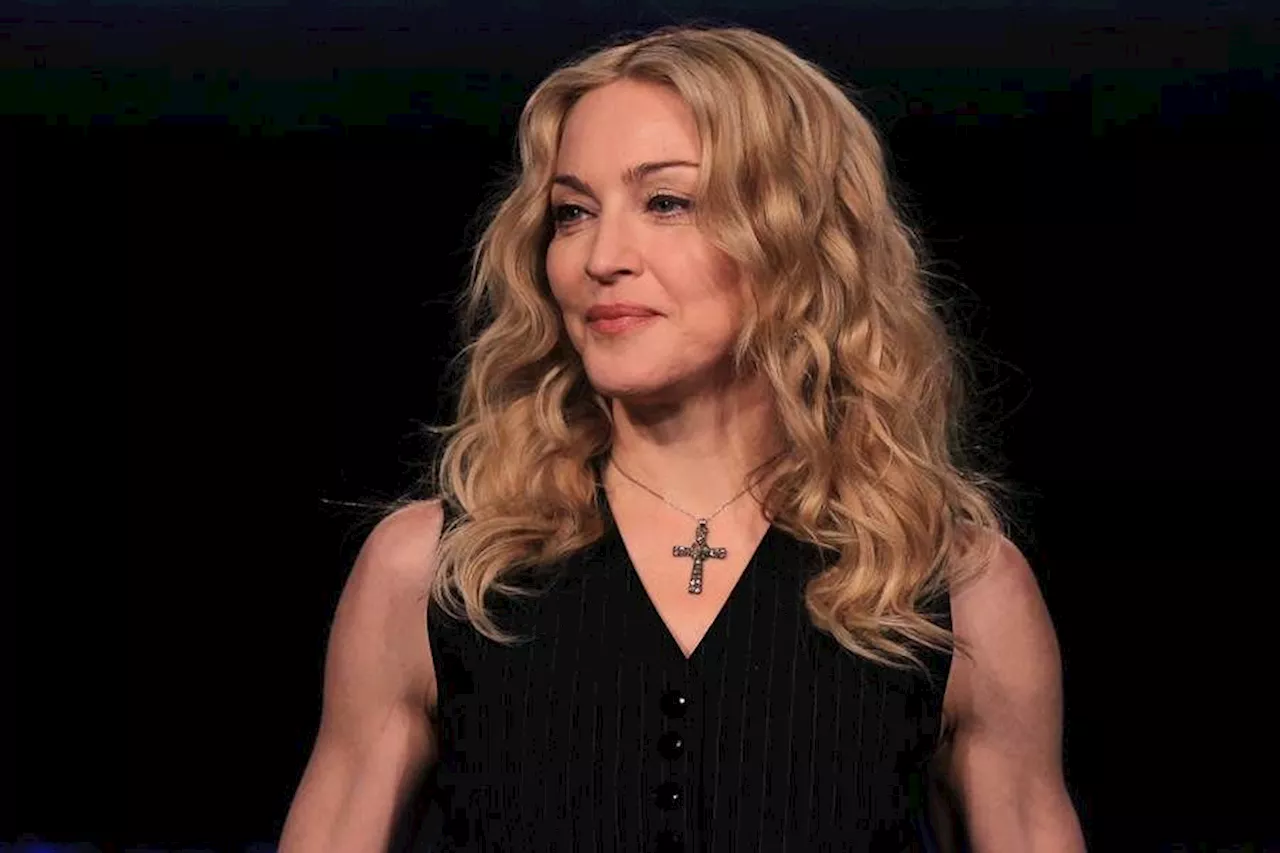 Someone Buy That Woman a Bra: Madonna Flashes Her Other Boob Onstage