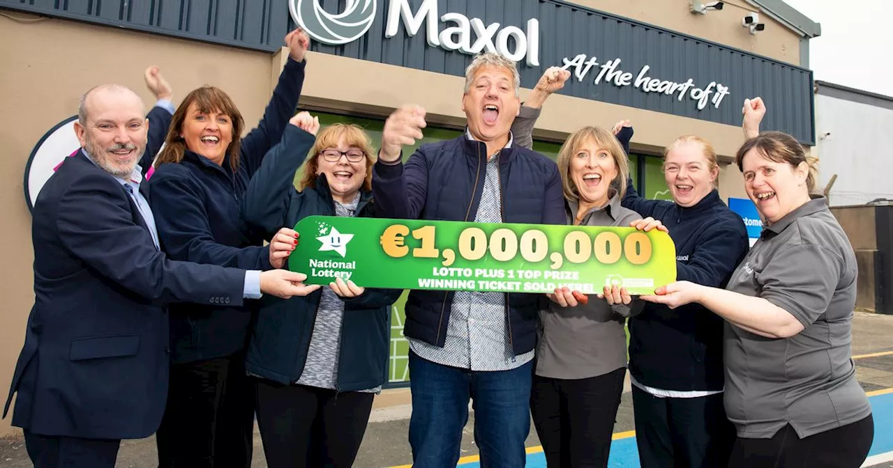 Family-run service station celebrates after making customer a Lotto millionaire