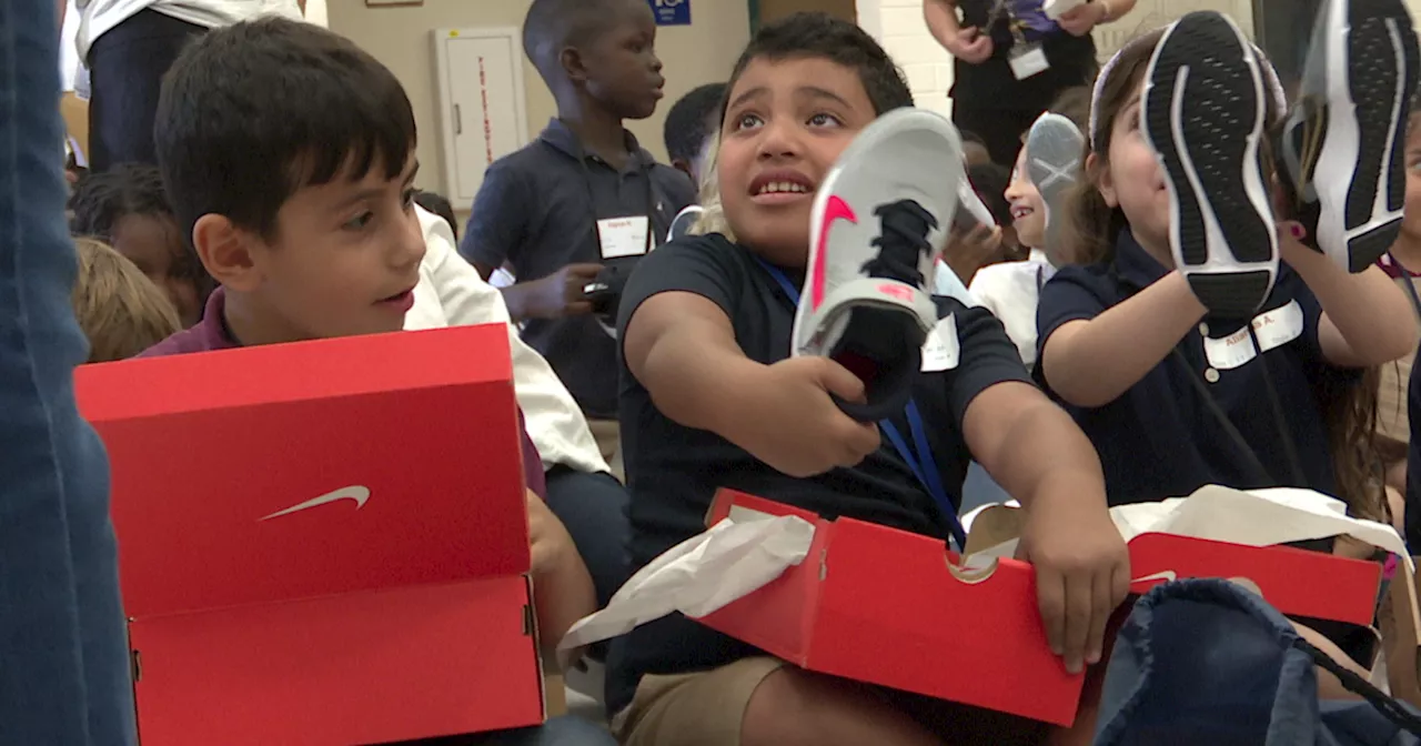 Midtown elementary school kids surprised with new shoes