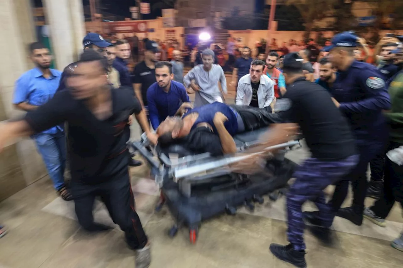 Hundreds dead at Gaza hospital as Israel, Hamas trade blame