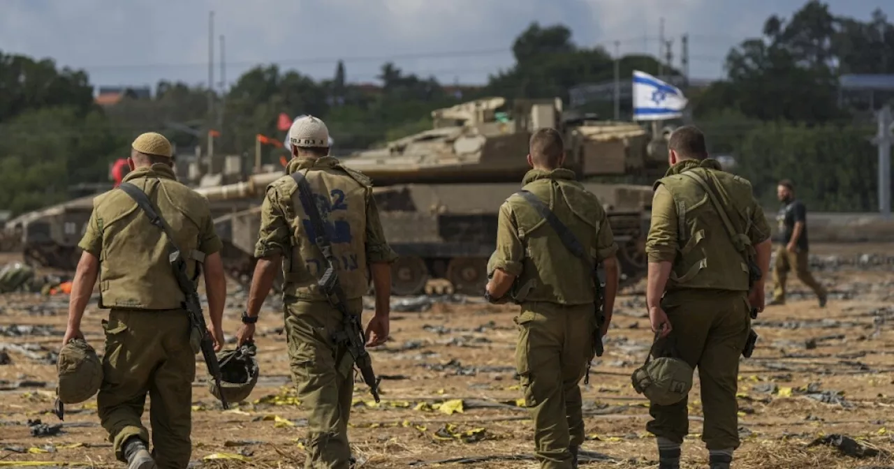 Israel's defense minister prepares troops for ground invasion of Gaza