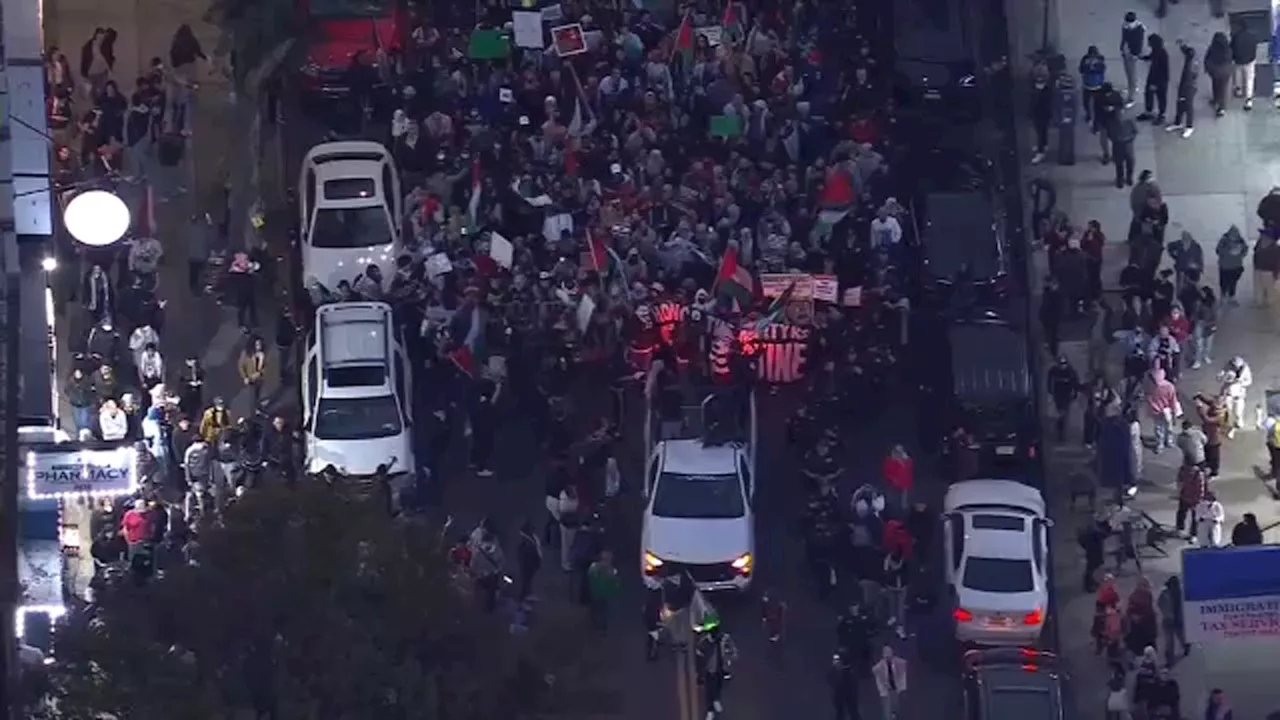 Pro-Palestinian demonstrators express frustration as they march through Astoria