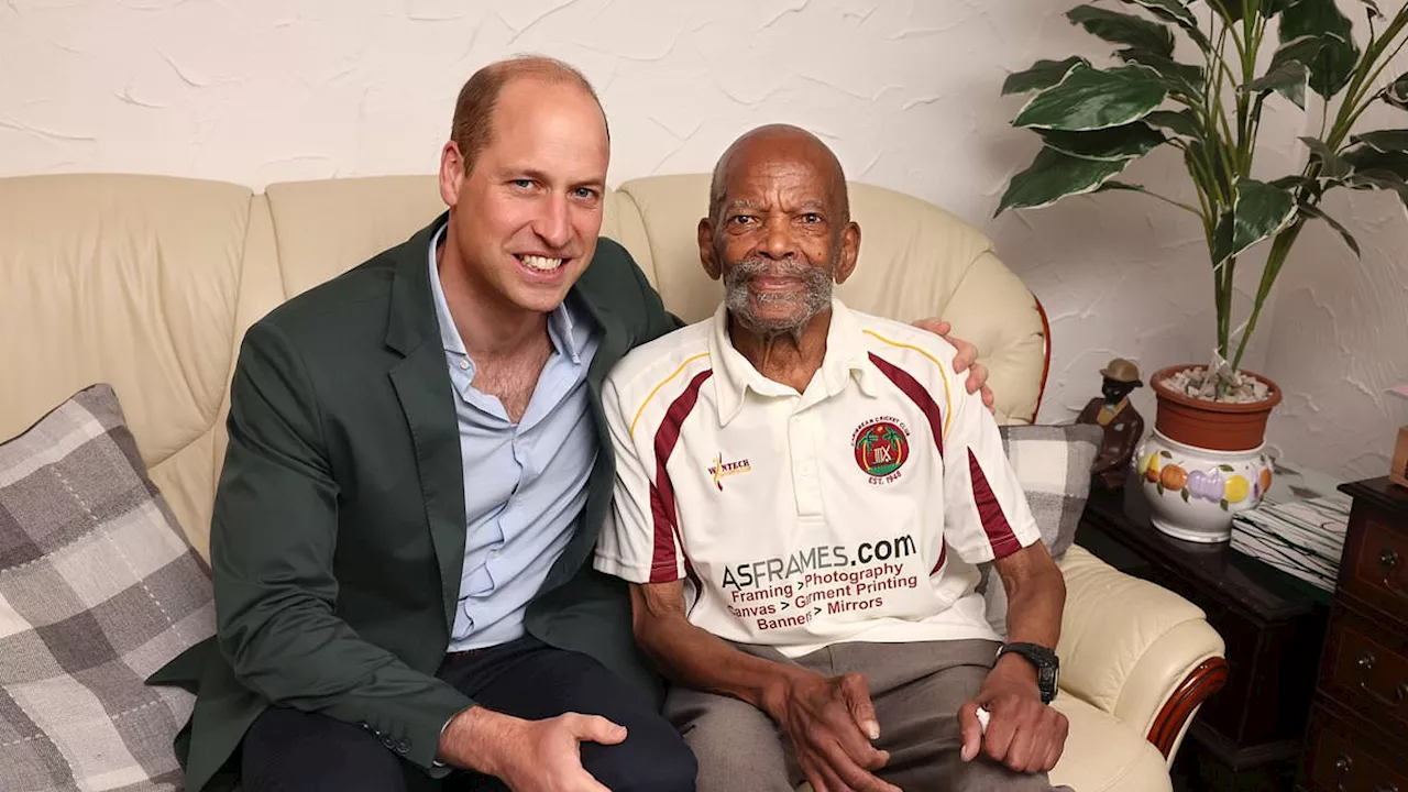 Heartwarming moment Prince William bats with HMT Empire Windrush passenger, 97, who founded a West...