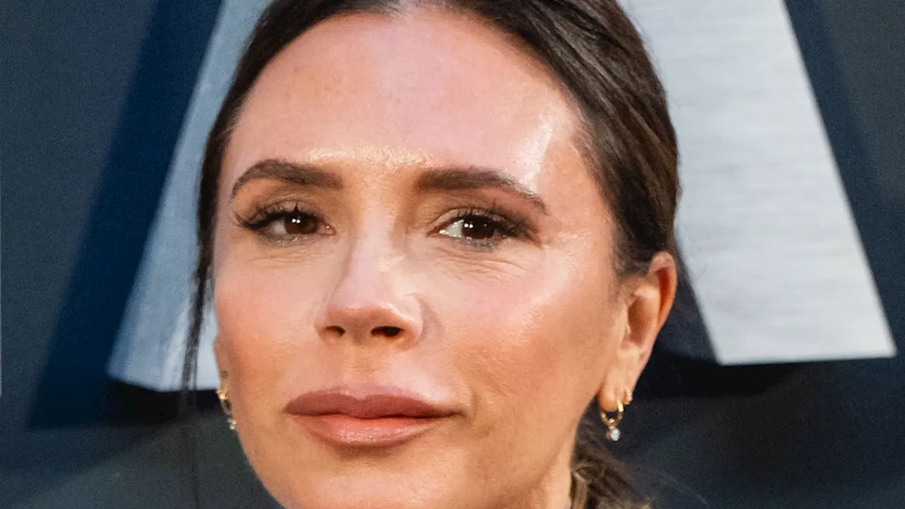 Victoria Beckham looks unbelievable in fishnets and V-neck dress