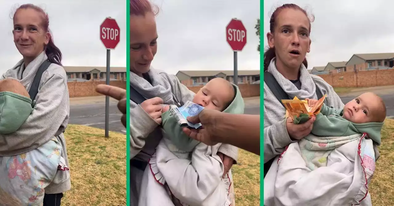 Needy mom's tears flow as BI Phakathi blesses her with cash for baby's birthday