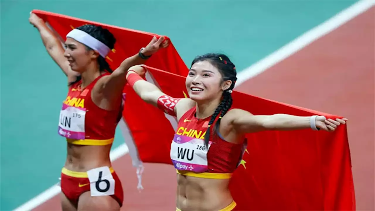 China thrill in track and field but footballers flop again at Asiad