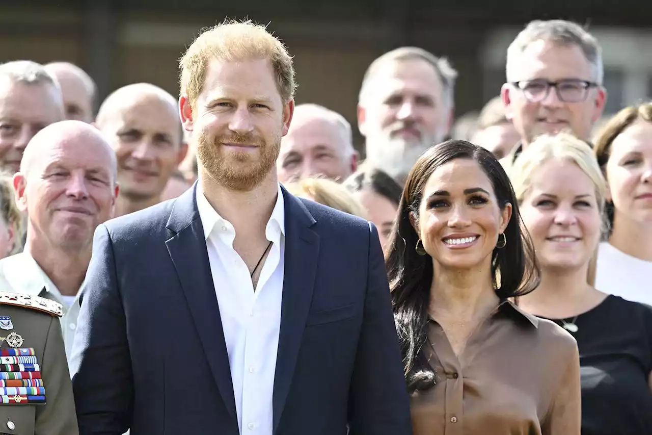 Meghan Markle and Prince Harry Share 'Lovely' Moments in Behind-the-Scenes Photos from Invictus Games