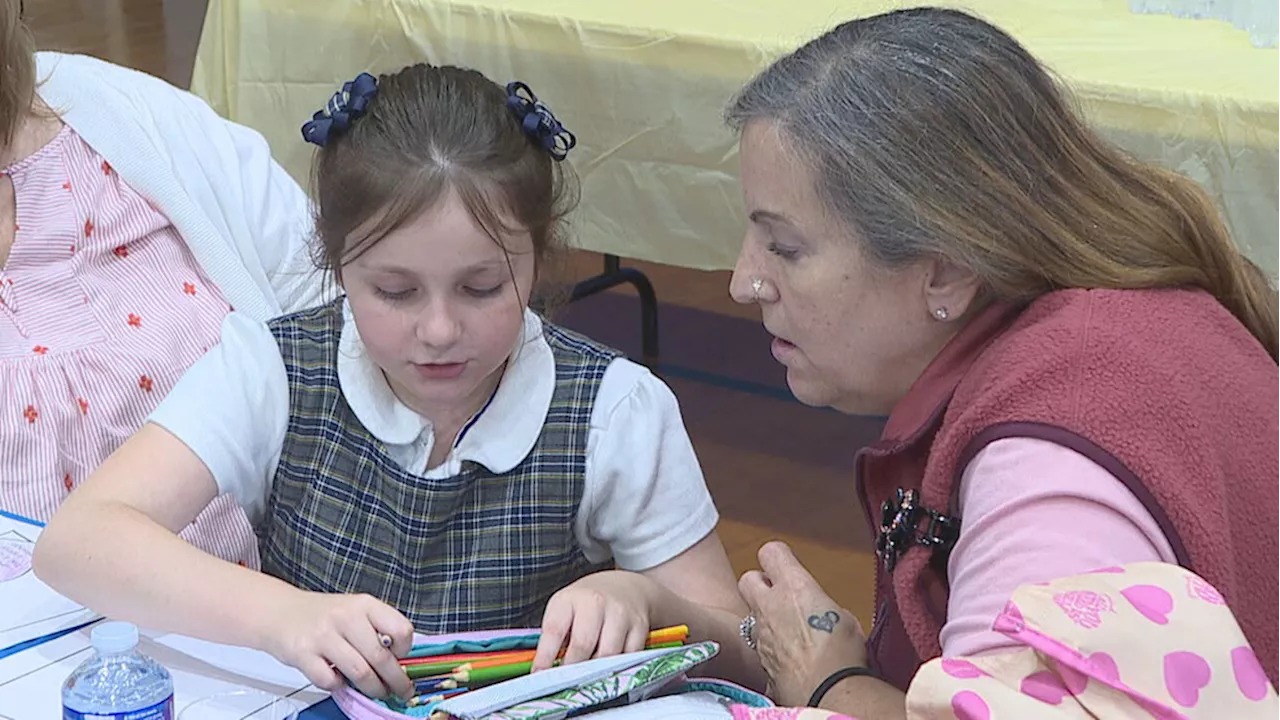 300+ loved ones join their grandchildren for annual Grandparents Day at St. Joseph School