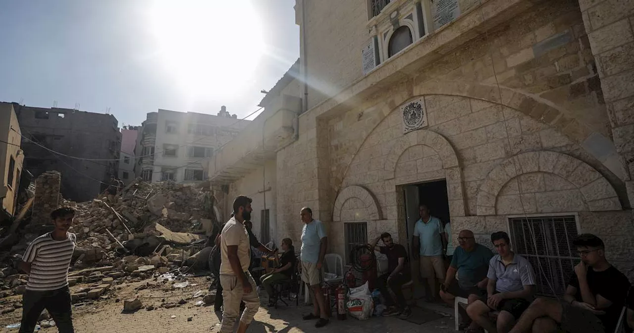 Israel levels Gaza district and strikes church where people had been sheltering